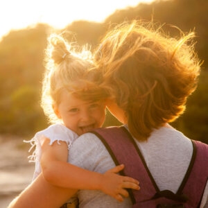 Child with her mother on the beach - Paediatric Dietitian